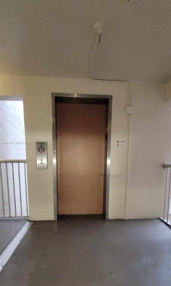 6155 Northwest 186th Street, Unit 308 Hialeah, FL 33015 - Photo 26 of 34 a view of empty room
