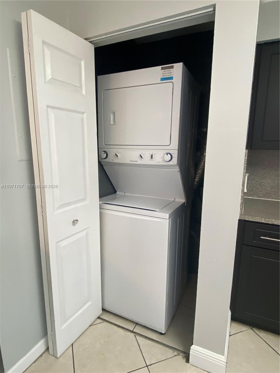 6155 Northwest 186th Street, Unit 308 Hialeah, FL 33015 - Photo 8 of 34 a utility room with dryer and washer