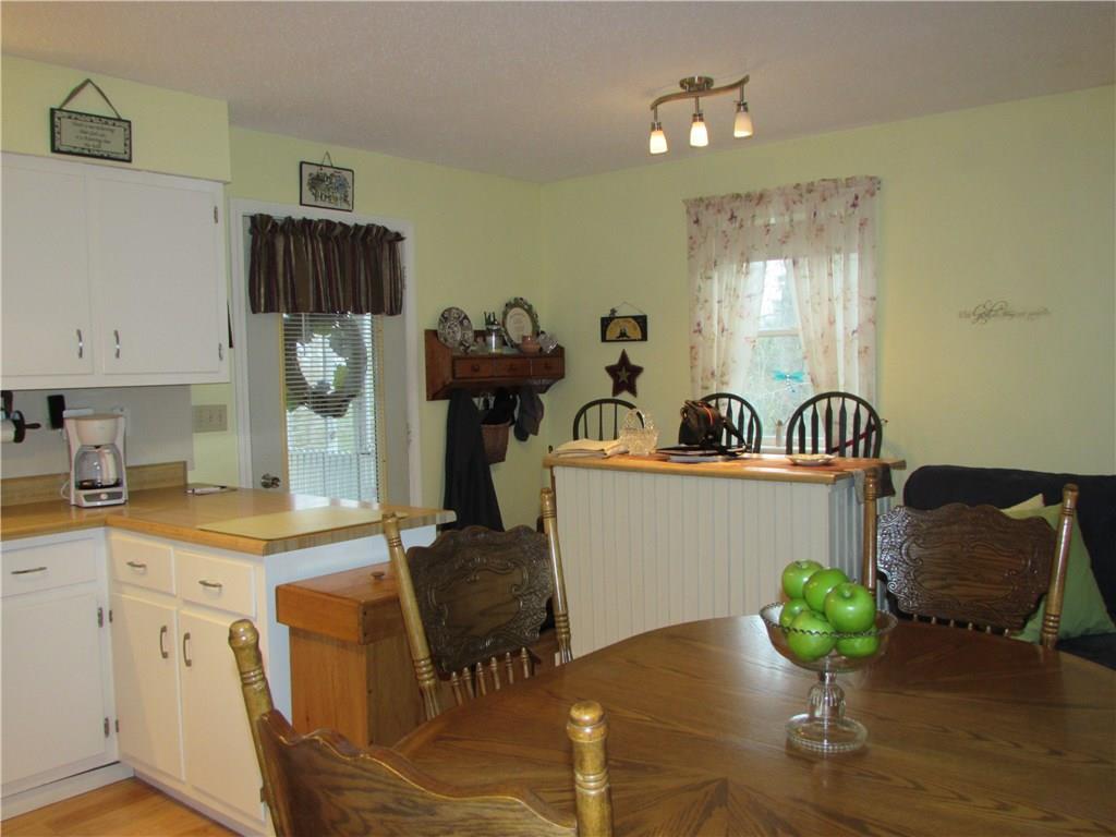 542 Upper E Pond Road Nobleboro, ME 04555 - Photo 4 of 22 Eat in kitchen with wood laminate...