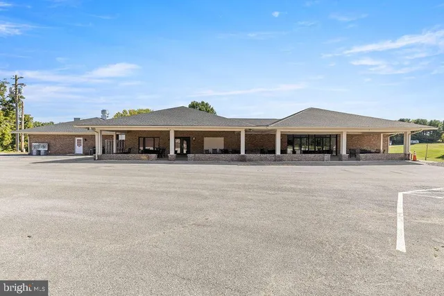 front view of a house with a patio