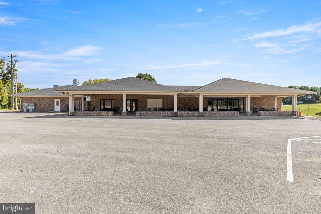 front view of a house with a patio