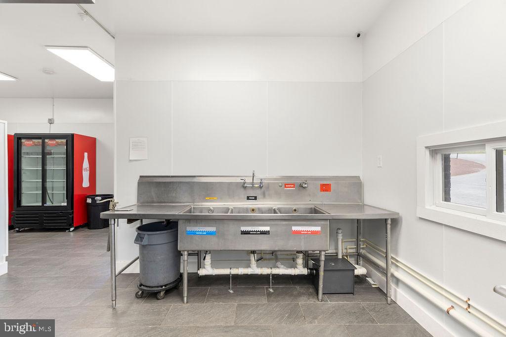 838 Bowling Green Road Front Royal, VA 22630 - Photo 21 of 66 a room with stainless steel appliances a sink and cabinets