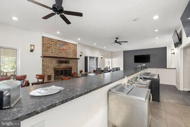 a view of a livingroom with furniture window and outside view