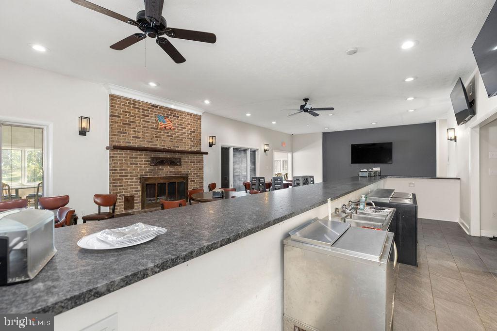 838 Bowling Green Road Front Royal, VA 22630 - Photo 27 of 66 a living room with furniture and a flat screen tv