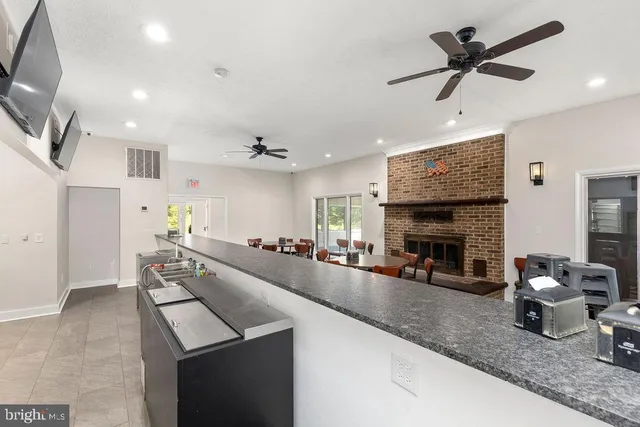 a view of a livingroom with furniture and dining room