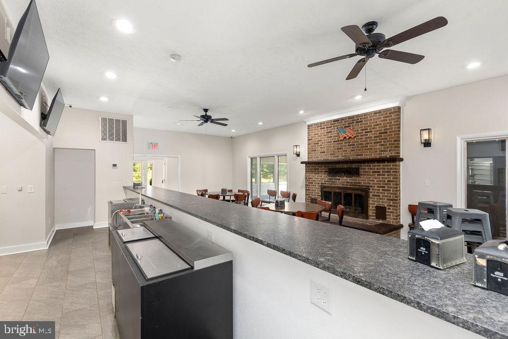 838 Bowling Green Road Front Royal, VA 22630 - Photo 29 of 66 a living room with furniture and a fireplace