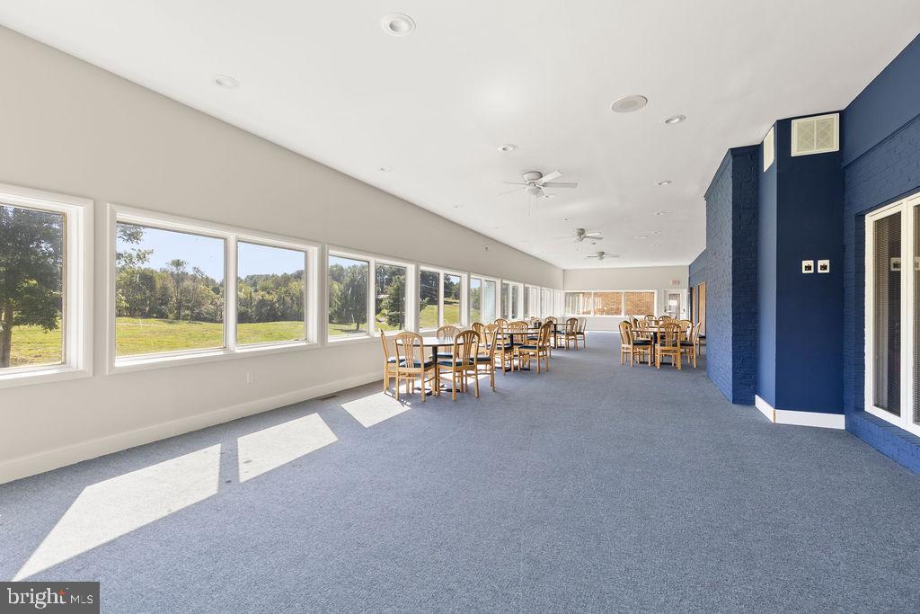 838 Bowling Green Road Front Royal, VA 22630 - Photo 36 of 66 a view of a livingroom with furniture and a large window