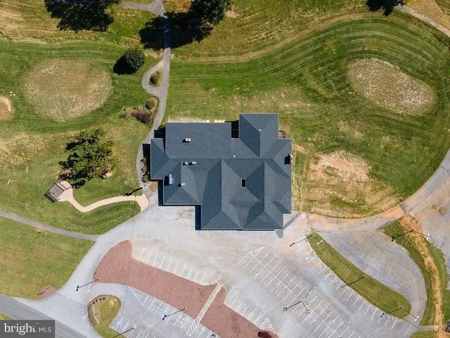 an aerial view of residential house with outdoor space
