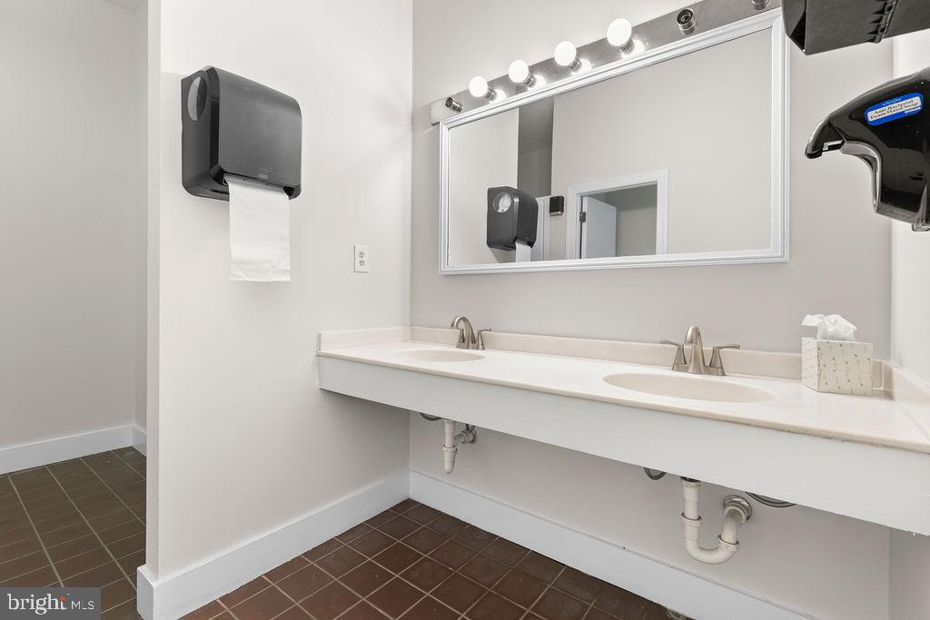 838 Bowling Green Road Front Royal, VA 22630 - Photo 41 of 66 a bathroom with a sink and a mirror