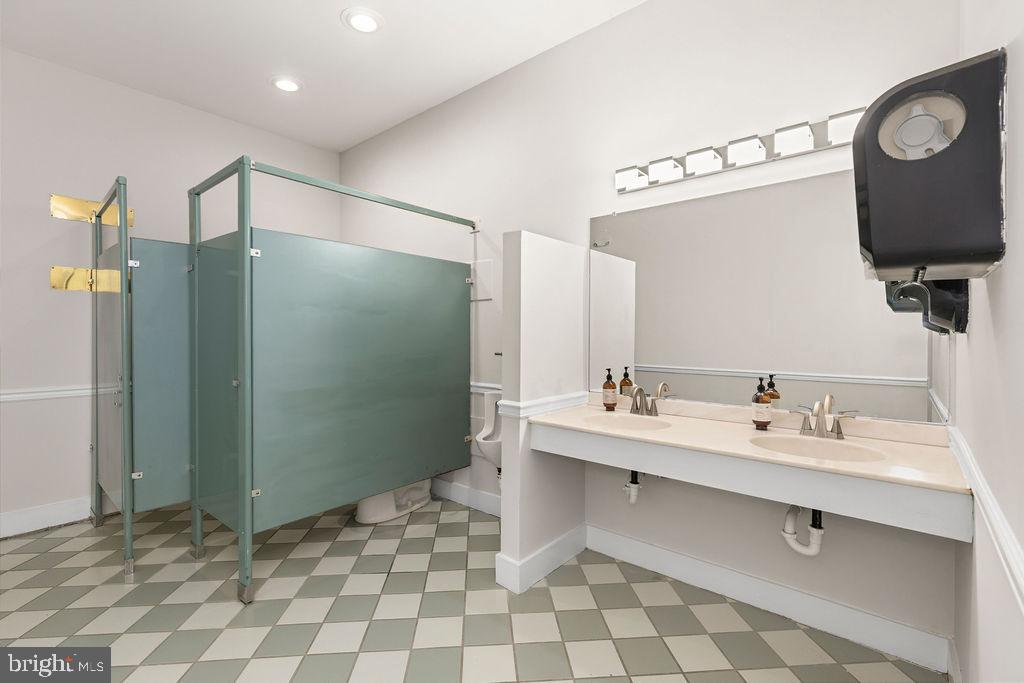 838 Bowling Green Road Front Royal, VA 22630 - Photo 49 of 66 a bathroom with a sink mirror and shower