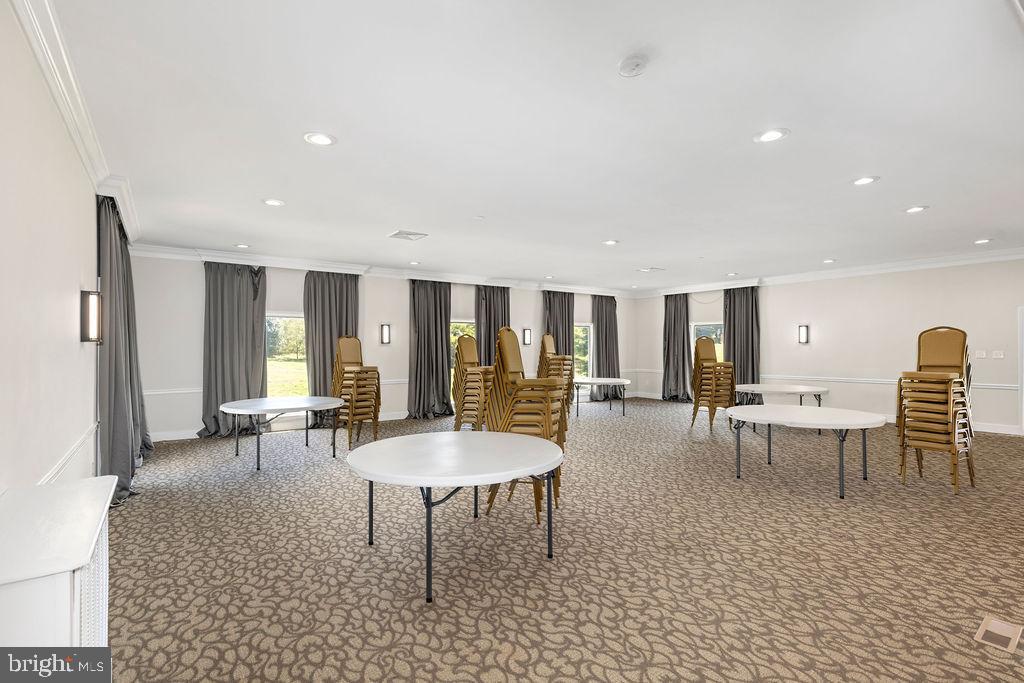 838 Bowling Green Road Front Royal, VA 22630 - Photo 60 of 66 a living room with furniture and large windows
