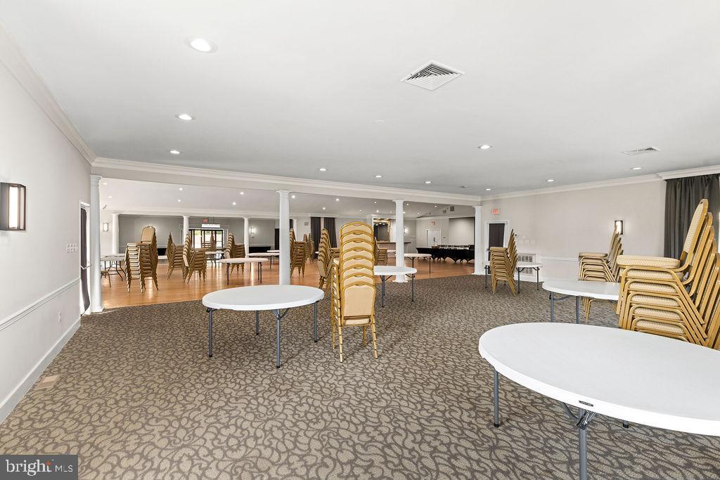 838 Bowling Green Road Front Royal, VA 22630 - Photo 61 of 66 a living room with furniture a table and kitchen view