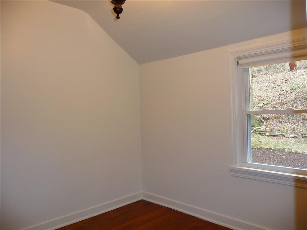 518 Braddock Road Forest Hills, PA 15221 - Photo 13 of 22 Third bedroom is small but very useful. Has a nice-sized closet.