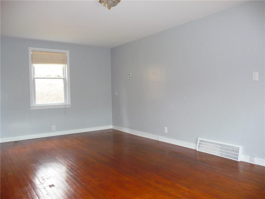 518 Braddock Road Forest Hills, PA 15221 - Photo 3 of 22 Nice sized living room has many possibilities for relaxation.