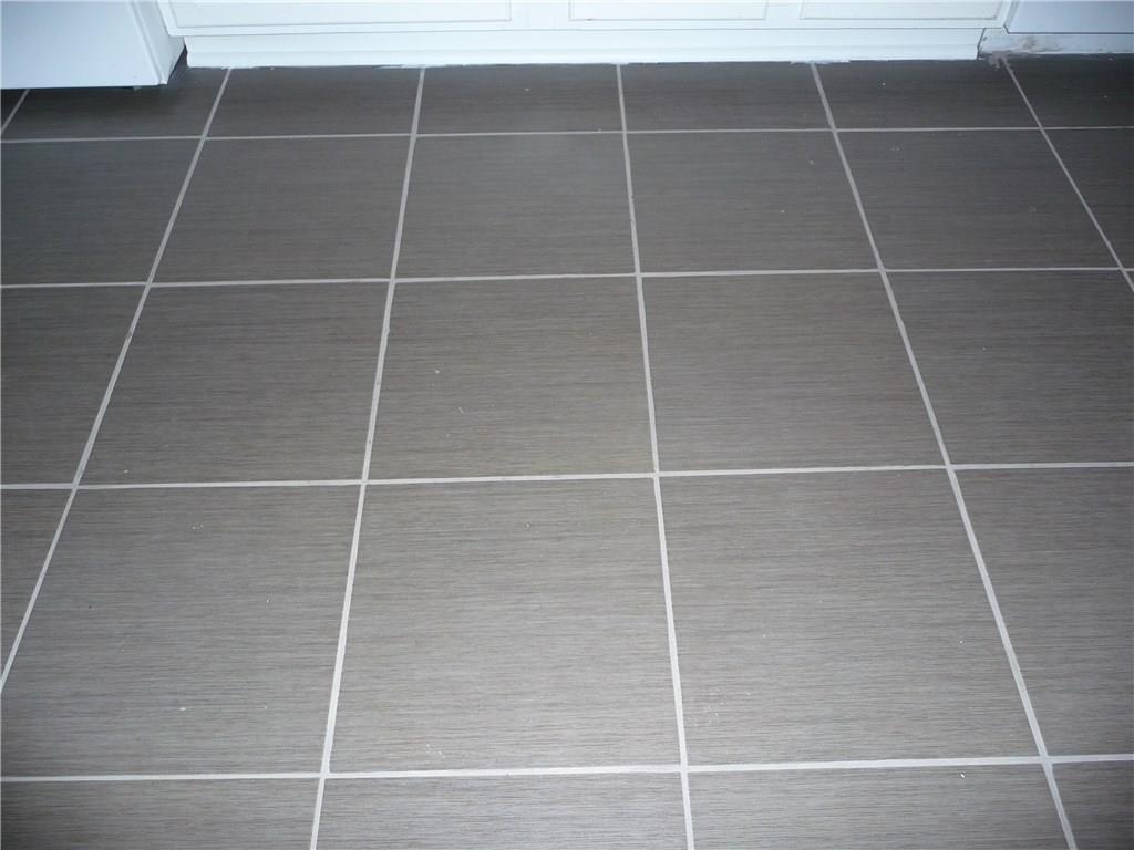 518 Braddock Road Forest Hills, PA 15221 - Photo 8 of 22 Grey porcelain tile in the kitchen is super attractive as well as practical.