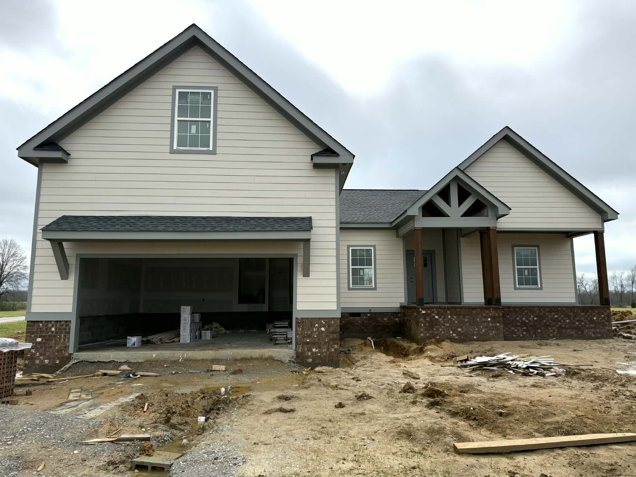 a front view of a house with yard