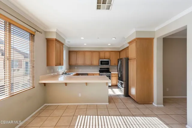 a view of kitchen with refrigerator sink and outdoor