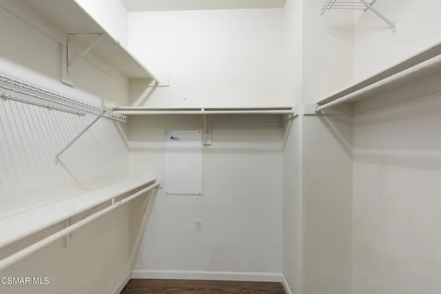 a view of an empty walk in closet