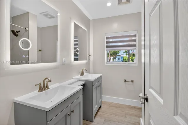 a view of room with window and ceiling fan