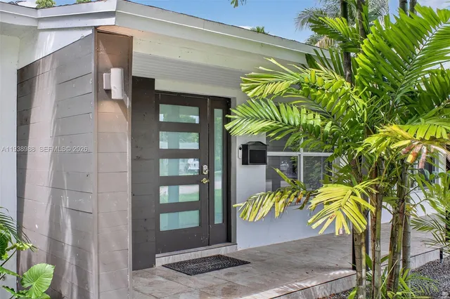 a view of a back yard of the house