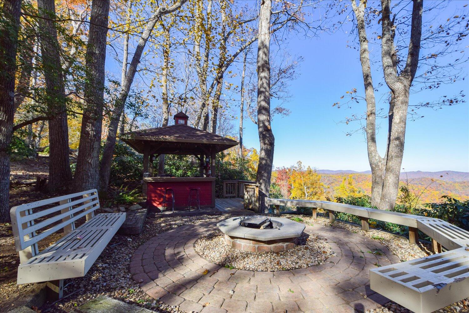 333 Hemlock Ridge Road Southeast Copper Hill, VA 24079 - Photo 13 of 45 an outdoor sitting area with furniture and wooden floor