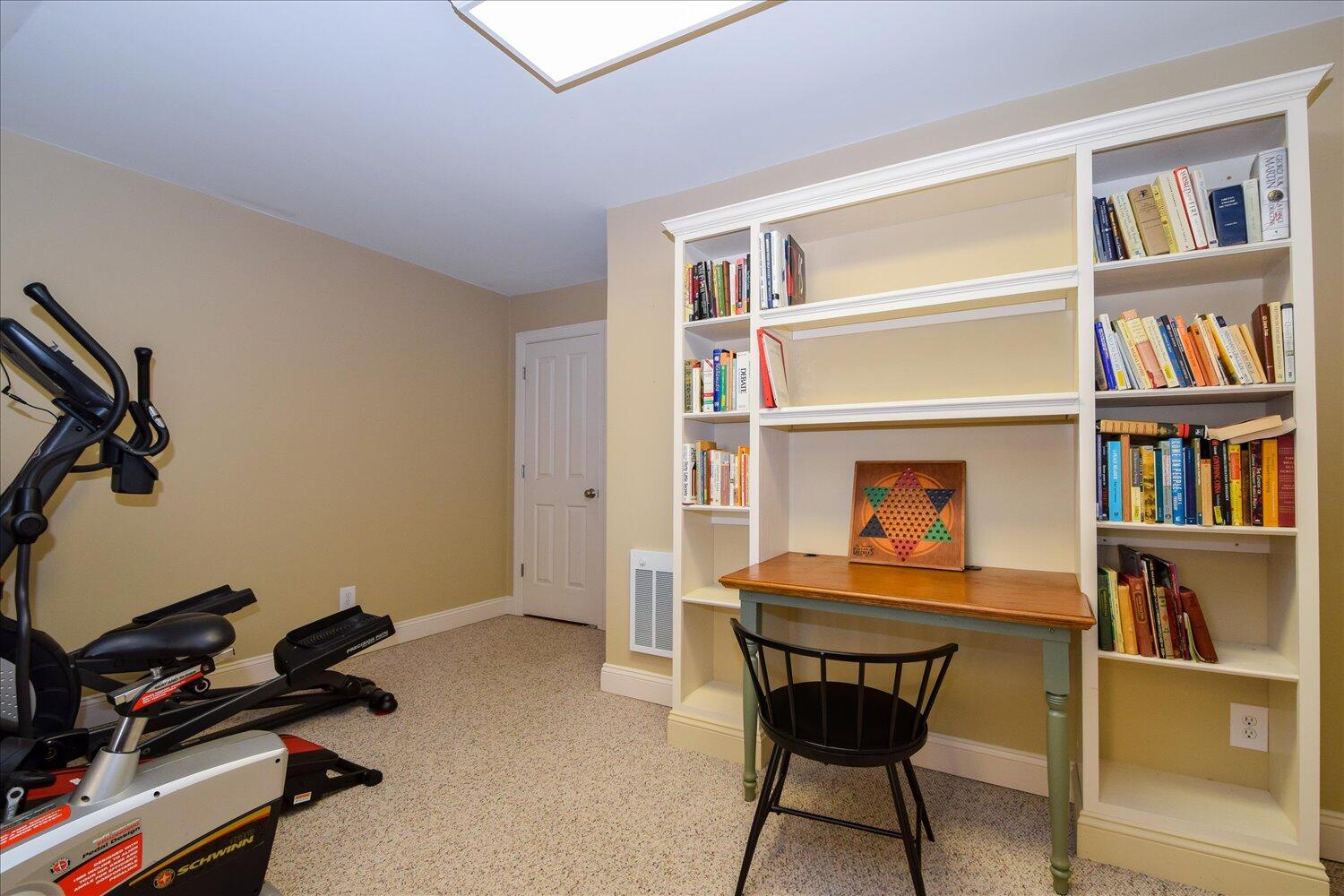 333 Hemlock Ridge Road Southeast Copper Hill, VA 24079 - Photo 34 of 45 a room with furniture and a book shelf