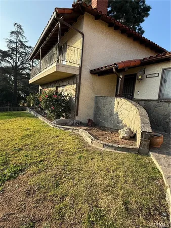 a house view with a outdoor space