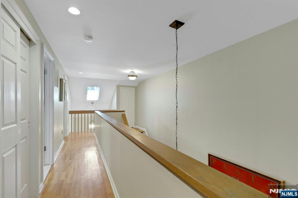 56 Longfellow Lane Mahwah, NJ 07430 - Photo 18 of 33 a view of a hallway with a large window