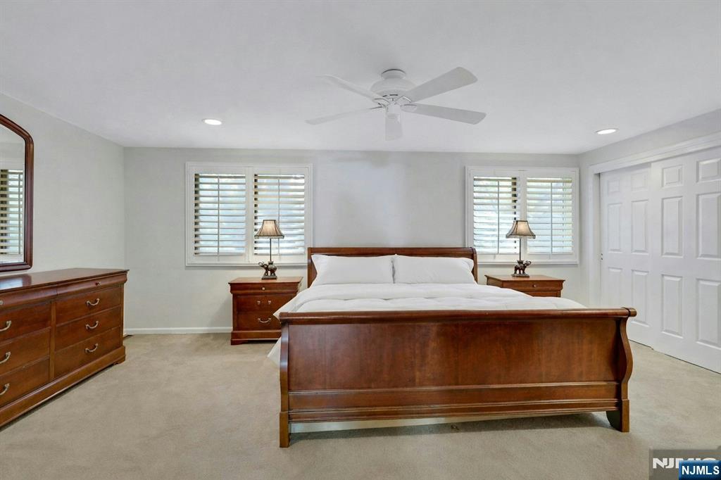 56 Longfellow Lane Mahwah, NJ 07430 - Photo 21 of 33 a bedroom with a bed and window