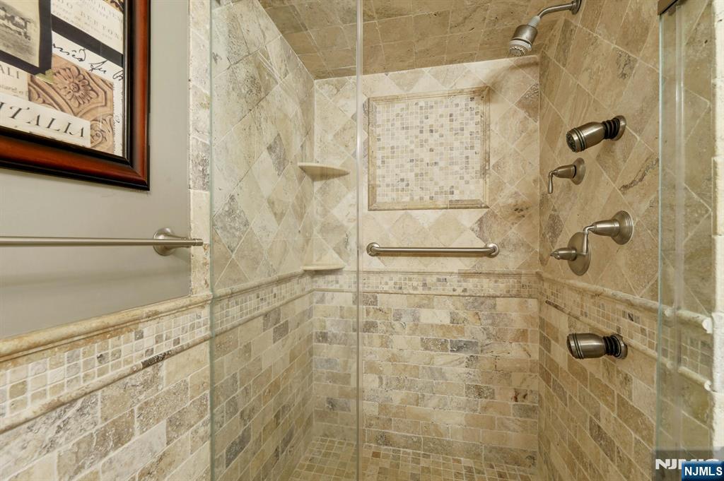 56 Longfellow Lane Mahwah, NJ 07430 - Photo 23 of 33 a bathroom with a shower