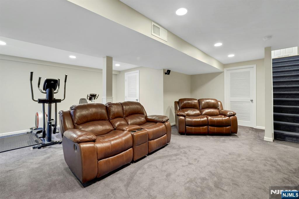 56 Longfellow Lane Mahwah, NJ 07430 - Photo 28 of 33 a living room with furniture and a window
