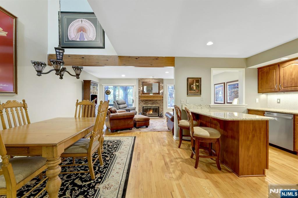56 Longfellow Lane Mahwah, NJ 07430 - Photo 10 of 33 a living room with furniture and a flat screen tv