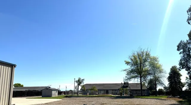 a view of swimming pool from a lounge chair