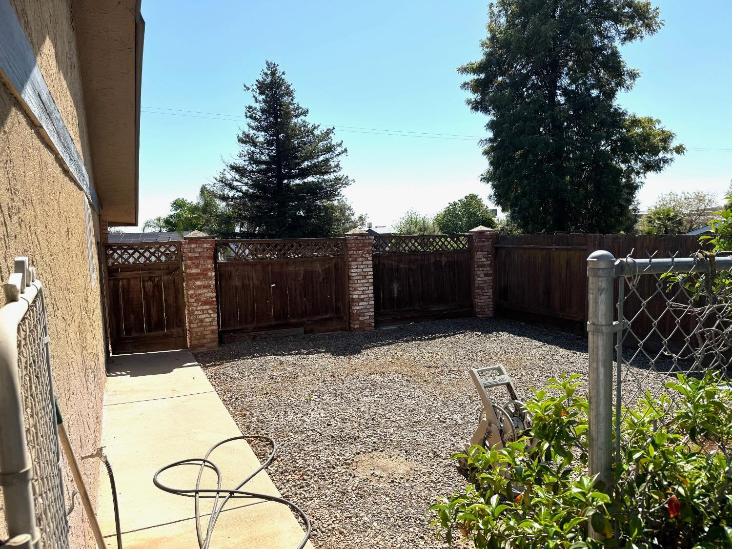 14728 Huntington Road Madera, CA 93636 - Photo 17 of 37 a view of a backyard