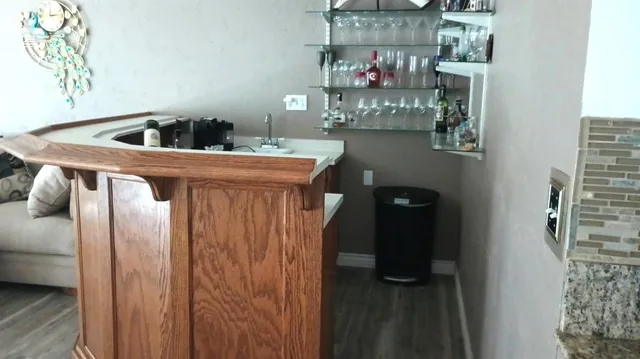 a kitchen with a sink and cabinets