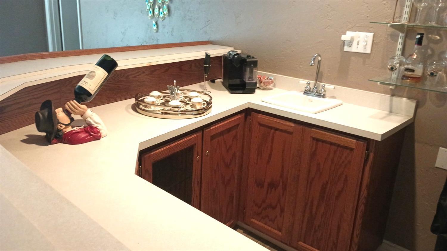 14728 Huntington Road Madera, CA 93636 - Photo 23 of 37 a bathroom with a sink and a mirror