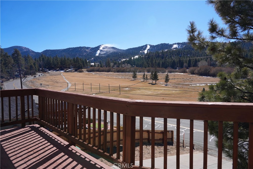 42958 Moonridge Road Big Bear Lake, CA 92315 - Photo 16 of 19 a view of a balcony with yard