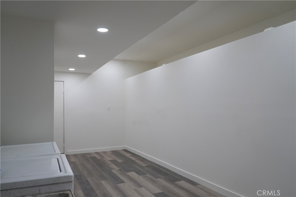 42958 Moonridge Road Big Bear Lake, CA 92315 - Photo 17 of 19 a view of hallway with wooden floor