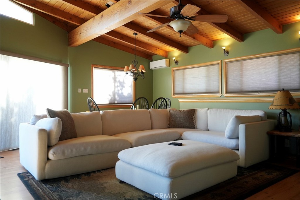 42958 Moonridge Road Big Bear Lake, CA 92315 - Photo 6 of 19 a living room with furniture and a large window