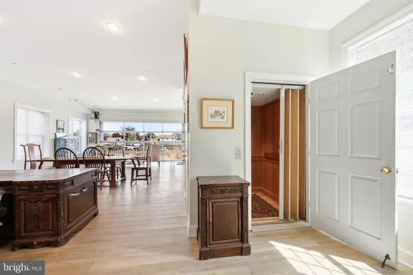 a view of a hallway with windows