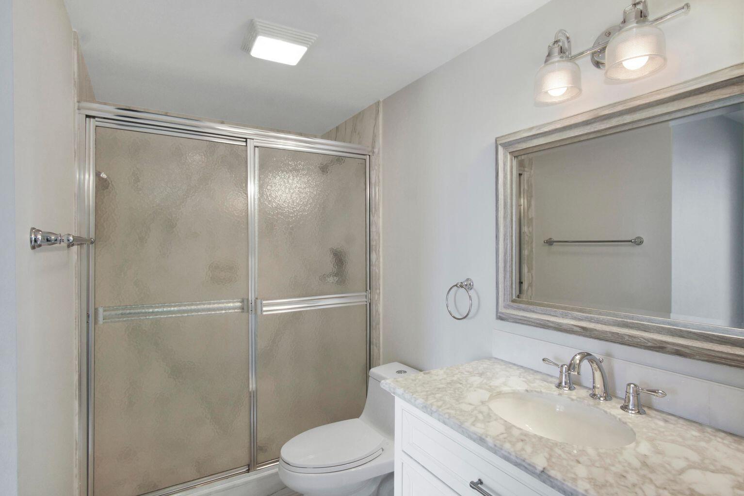 200 South Beach Road, Unit 103 Tequesta, FL 33469 - Photo 15 of 28 103 bathroom