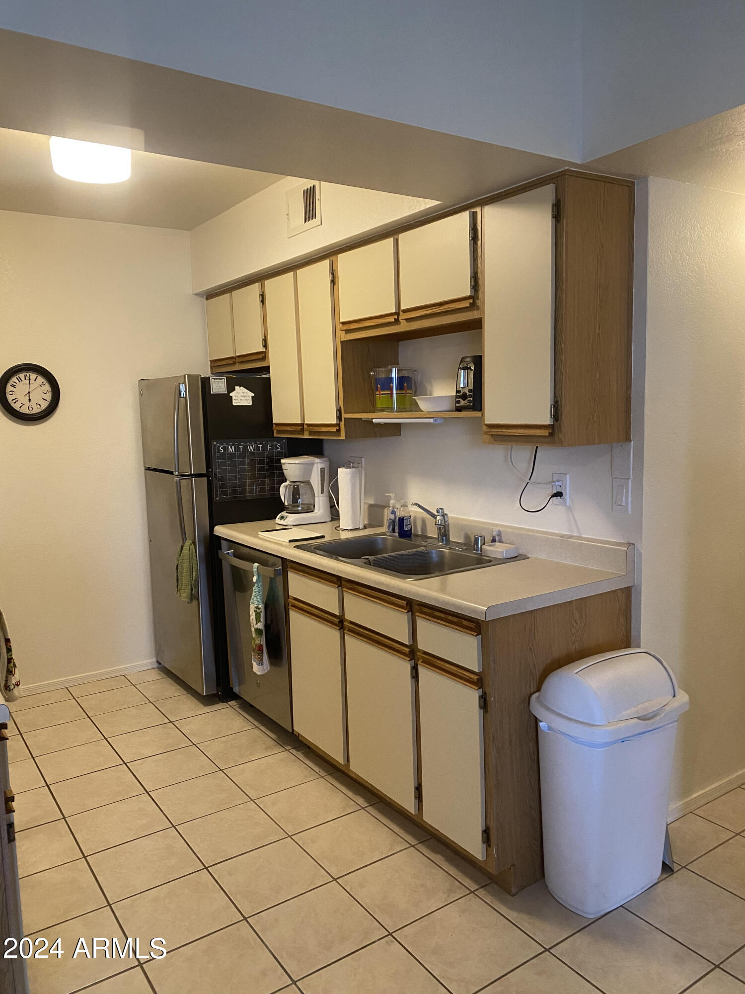 1440 North Idaho Road, Unit 1013 Apache Junction, AZ 85119 - Photo 20 of 40 a kitchen with a sink cabinets and appliances