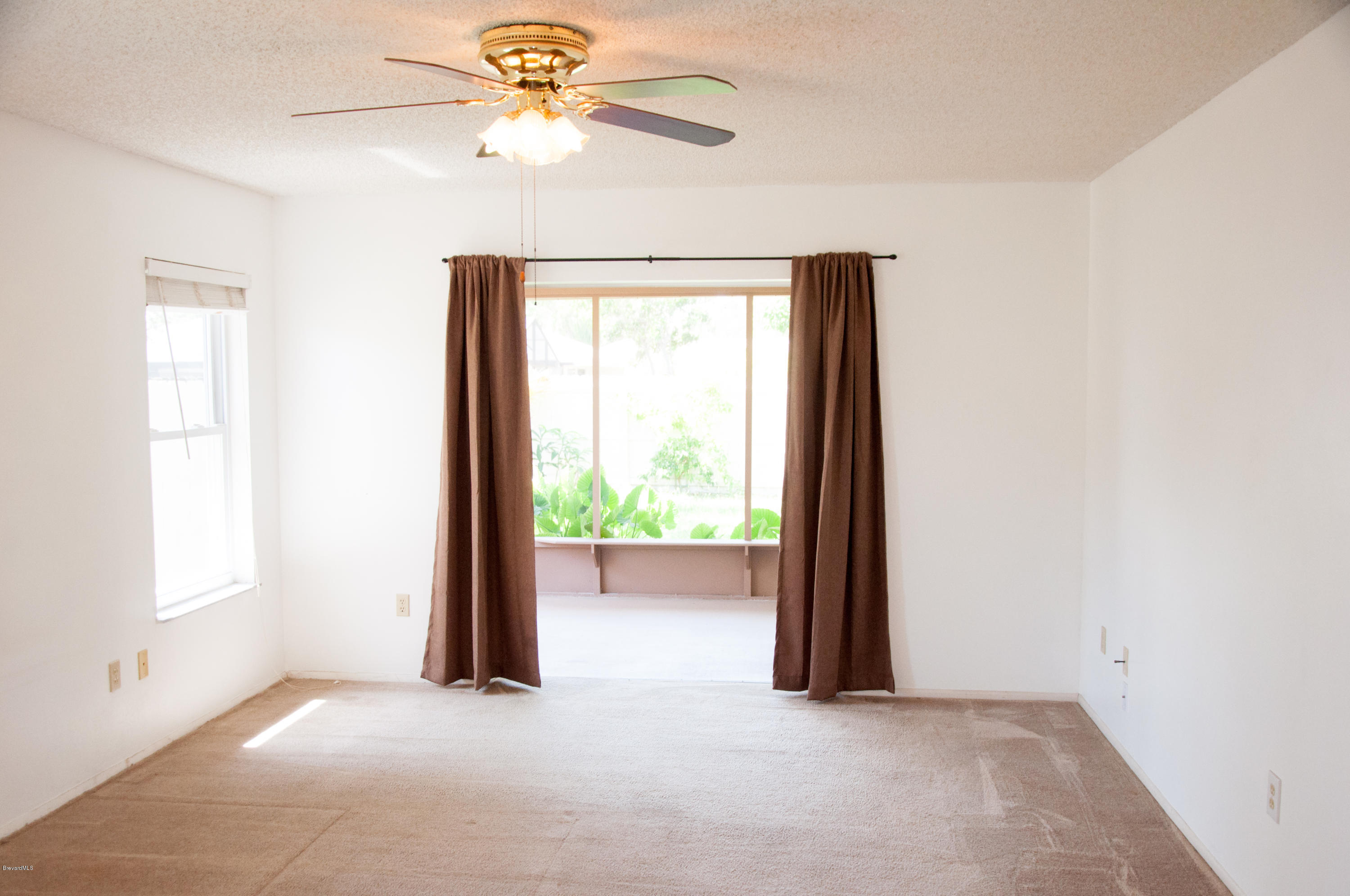 2164 Clover Street Northeast Palm Bay, FL 32905 - Photo 11 of 25 Master View to Patio