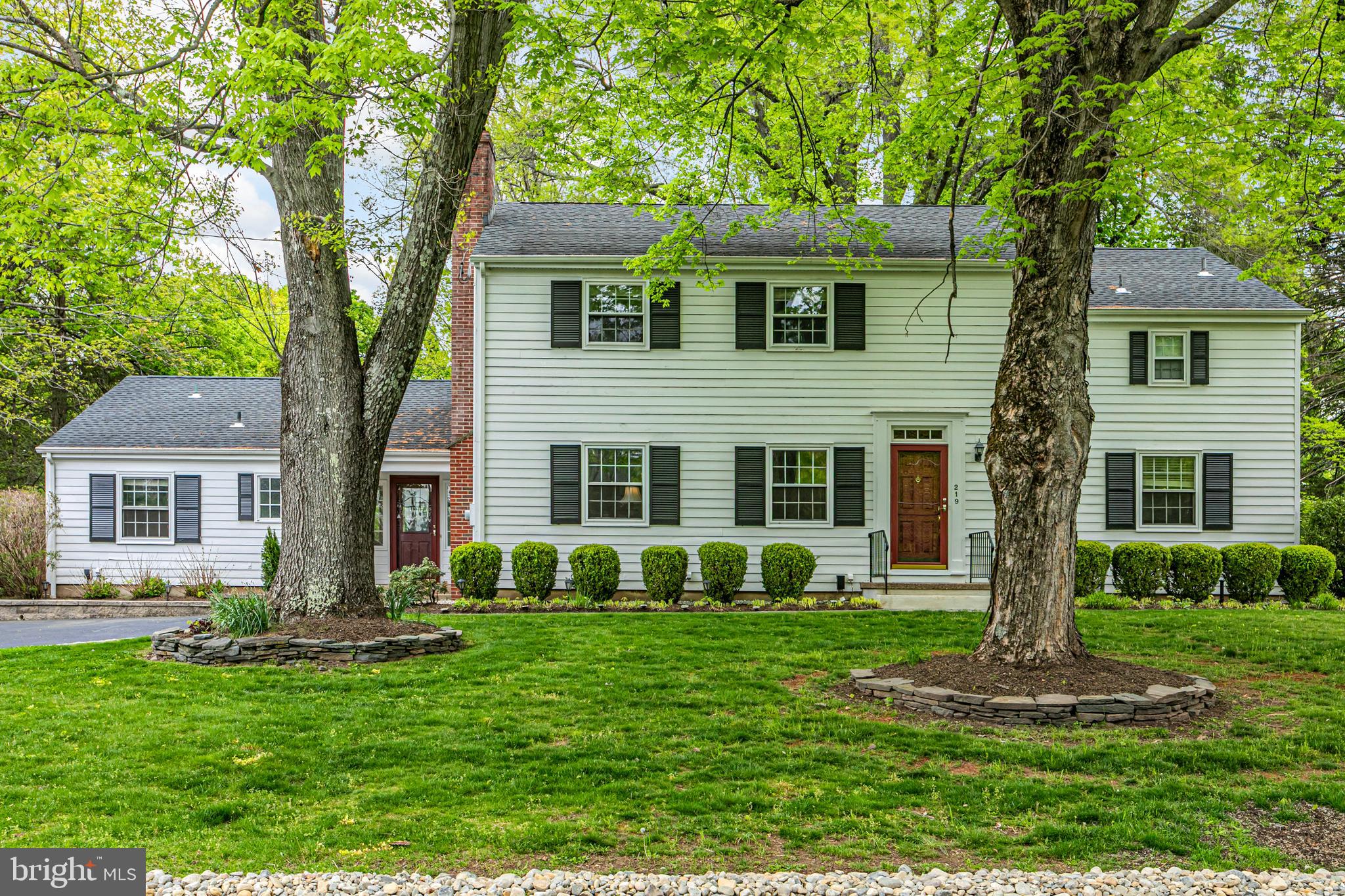 219 Russell Road Princeton, NJ 08540 - Photo 1 of 27 a front view of a house with a yard