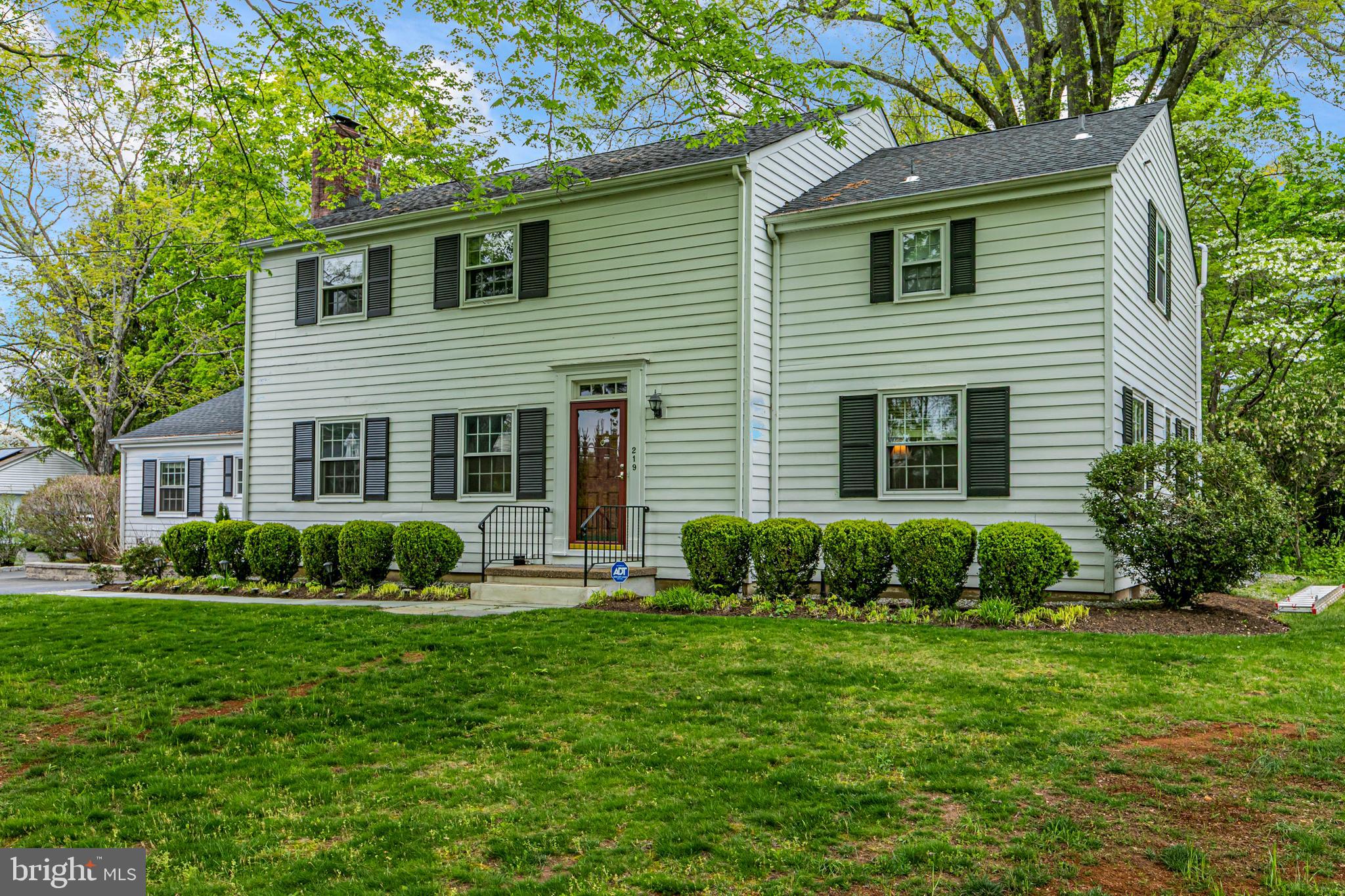 219 Russell Road Princeton, NJ 08540 - Photo 2 of 27 a front view of a house with garden and porch