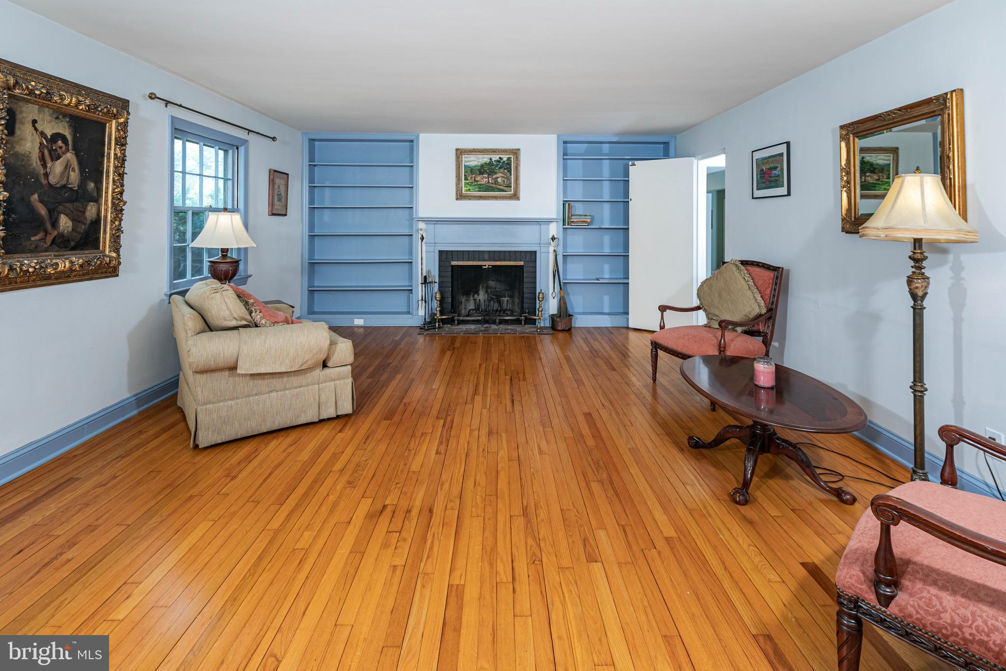 219 Russell Road Princeton, NJ 08540 - Photo 5 of 27 a living room with furniture and a fireplace