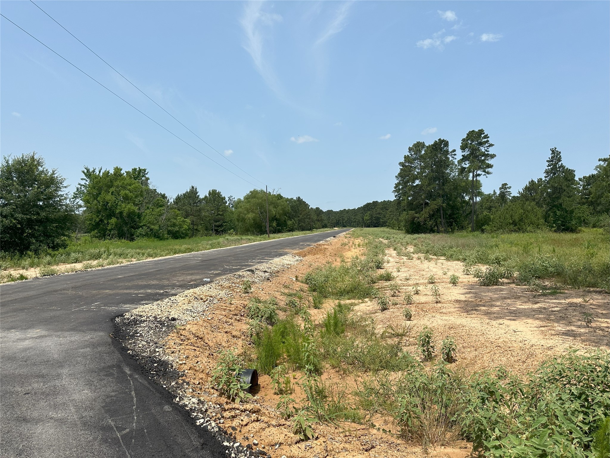 31931 Boone Road Waller, TX 77484 - Photo 17 of 19 a view of a lake view