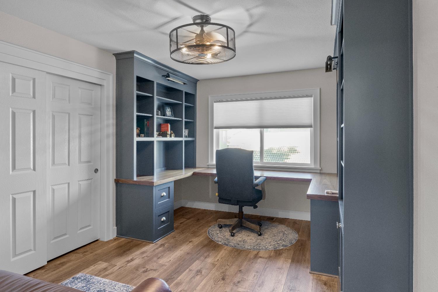 637 Rebekah Court Ripon, CA 95366 - Photo 30 of 69 a view of a workspace with furniture and a window