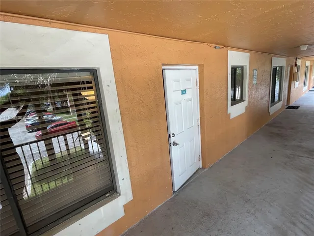 a view of street with parked cars