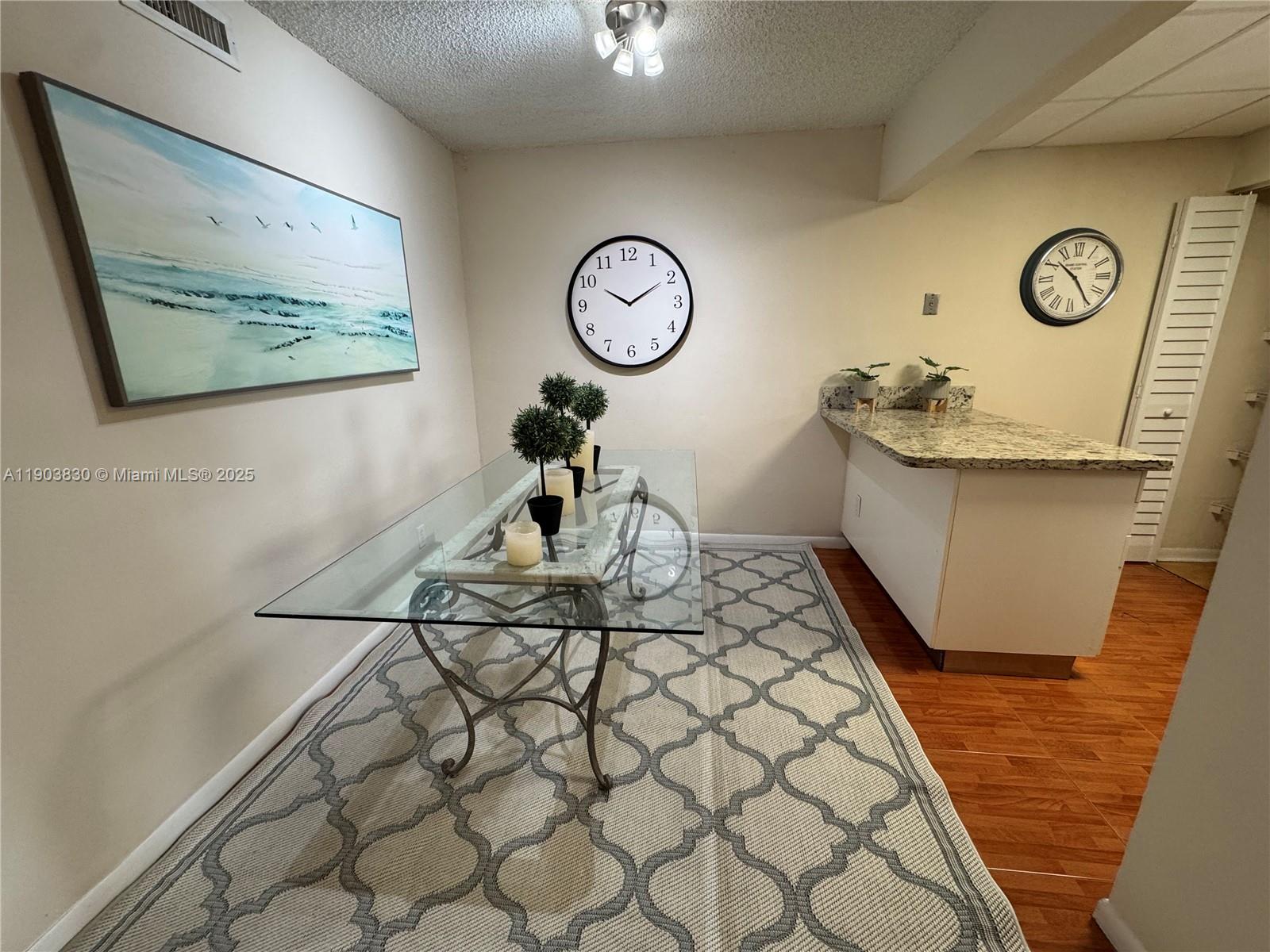 6900 Southwest 39th Street, Unit 206J Davie, FL 33314 - Photo 9 of 34 a living room with a couch and cabinets
